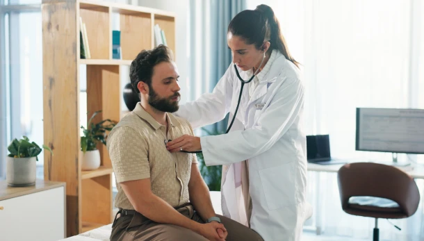 Doctor examining patient
